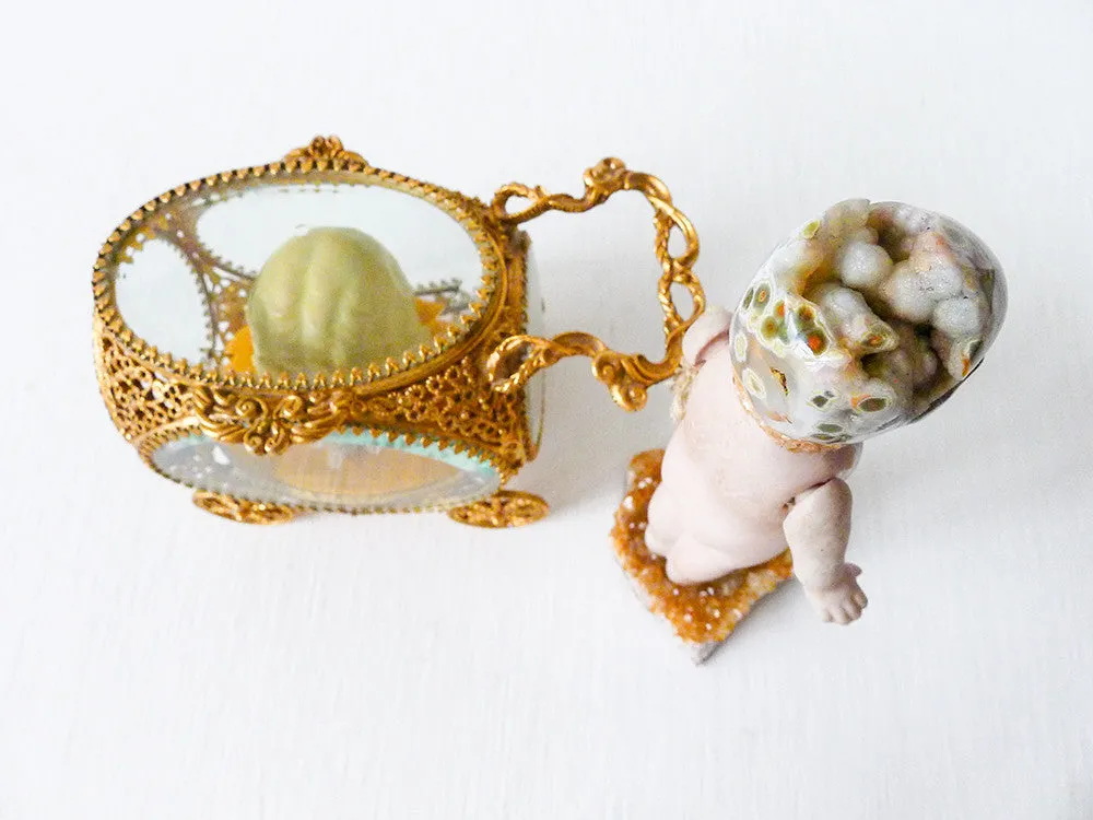 Carrying Ozma'z Head Antique German Bisque Doll with Ocean Jasper Crystal Skull