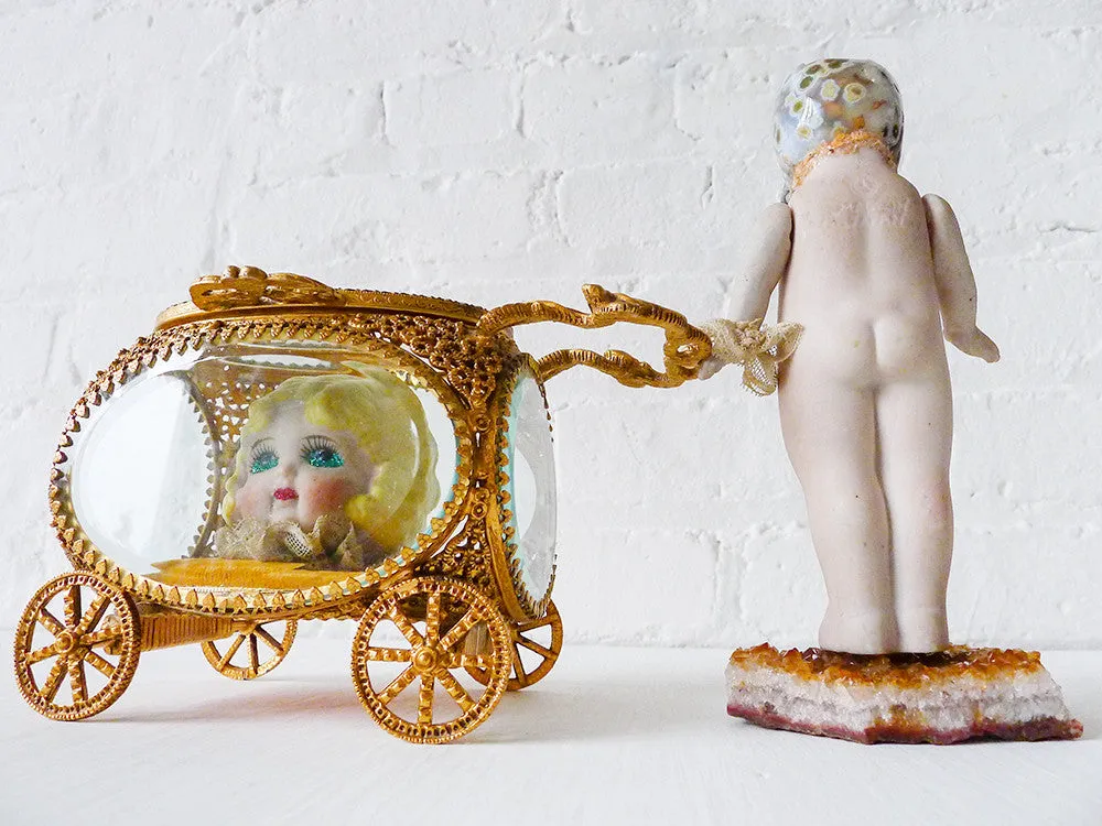 Carrying Ozma'z Head Antique German Bisque Doll with Ocean Jasper Crystal Skull