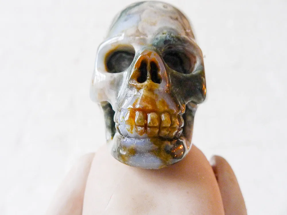 Carrying Ozma'z Head Antique German Bisque Doll with Ocean Jasper Crystal Skull